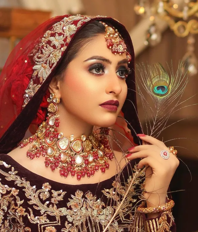 Bridal look — maroon peacock feather