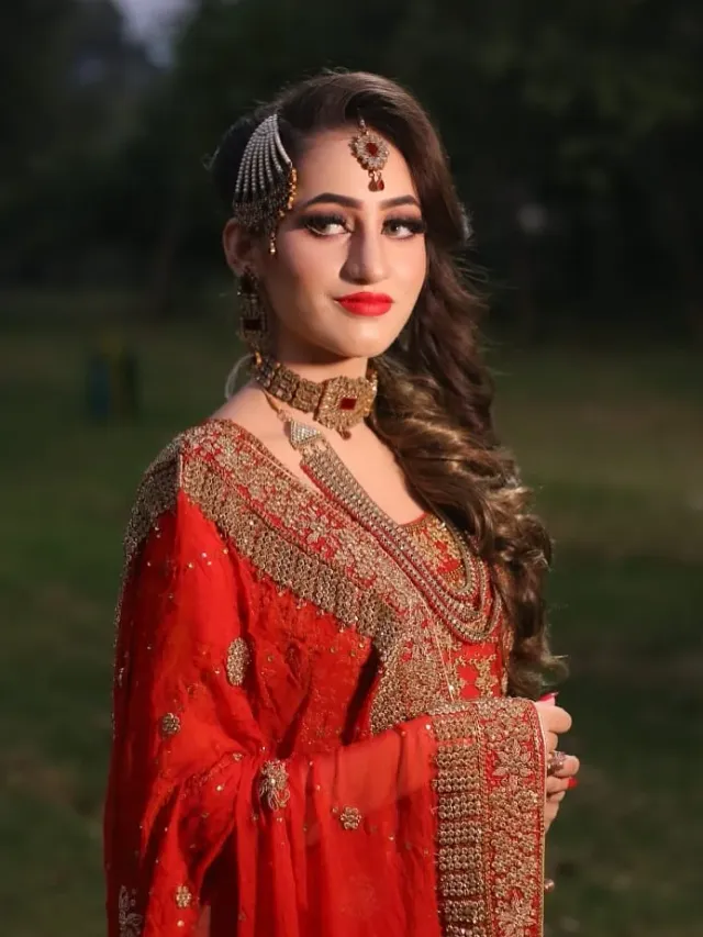 Bridal look — red outfit heavy jewelry outdoor