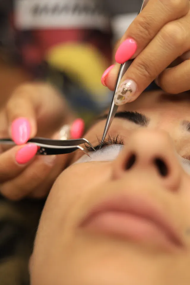 Lashes look — extension application closeup