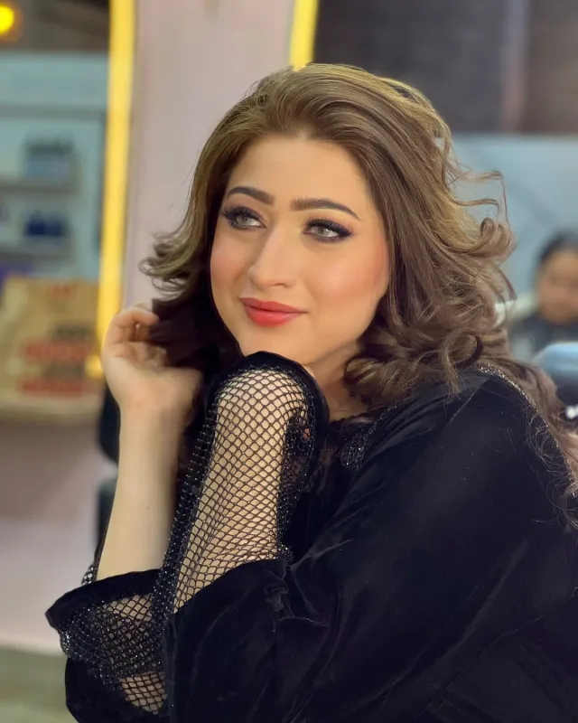 Makeup look — glam black outfit winged liner