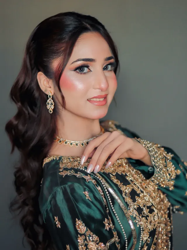Soft glam makeup with a green outfit