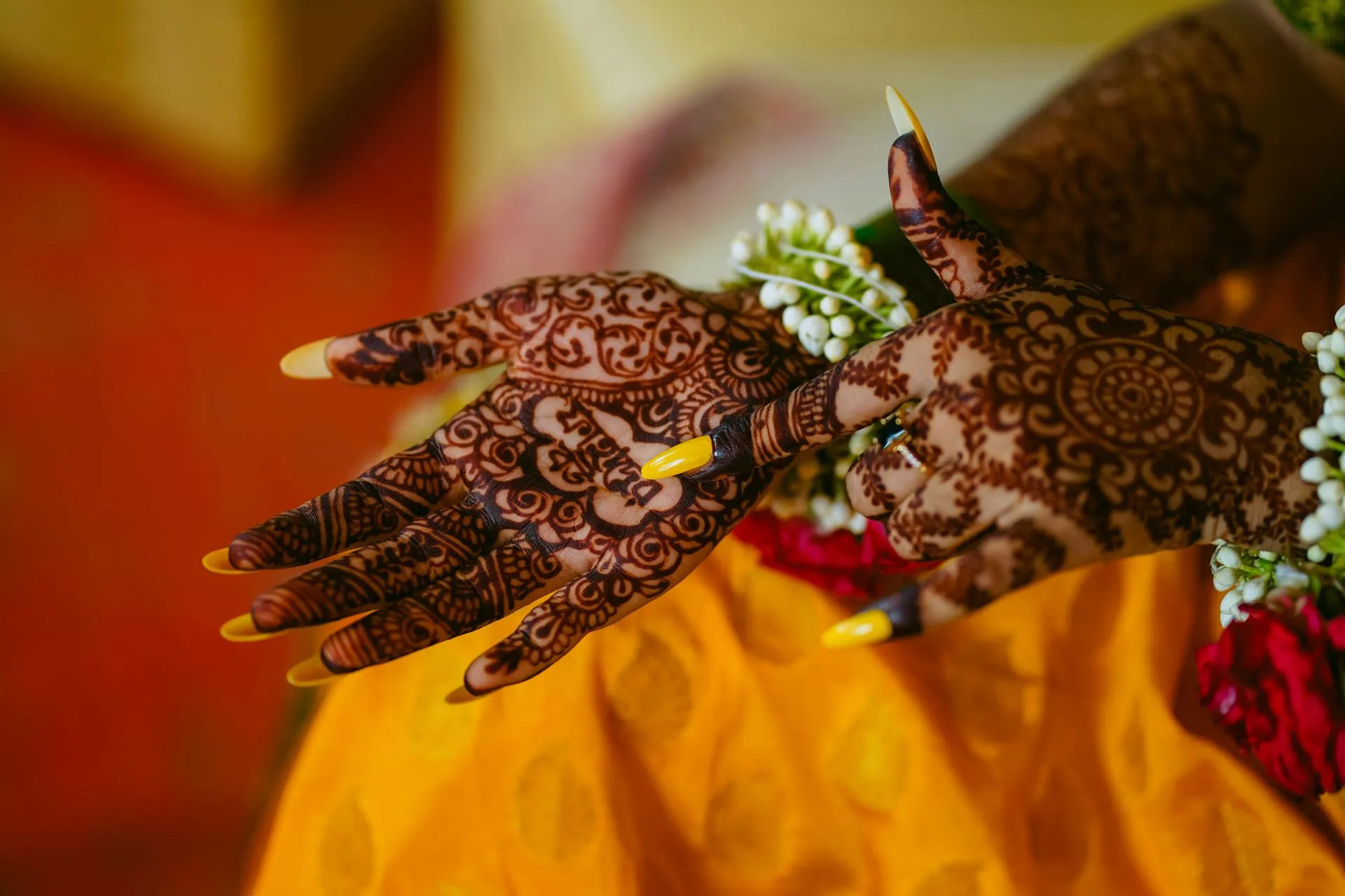 Intricate bridal mehndi designs on a bride’s hands